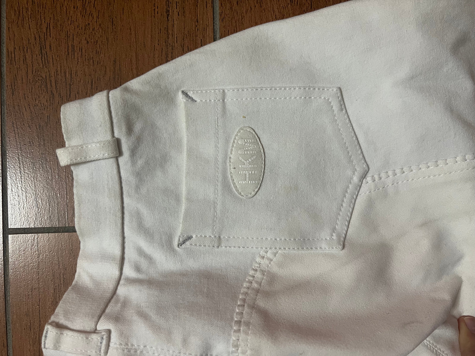 PANTALONE EQUITAZIONE DA BAMBINA BIANCO IN TESSUTO TECNICO CON TOPPE IN NABUR TONO SU TONO